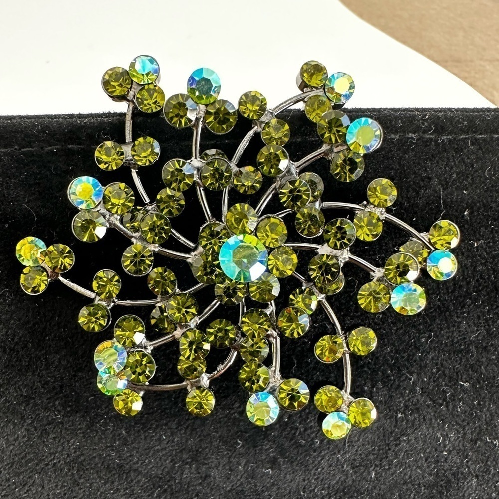 Vintage Brooch with green and iridescent crystals on leaded sprouts 21/4”
